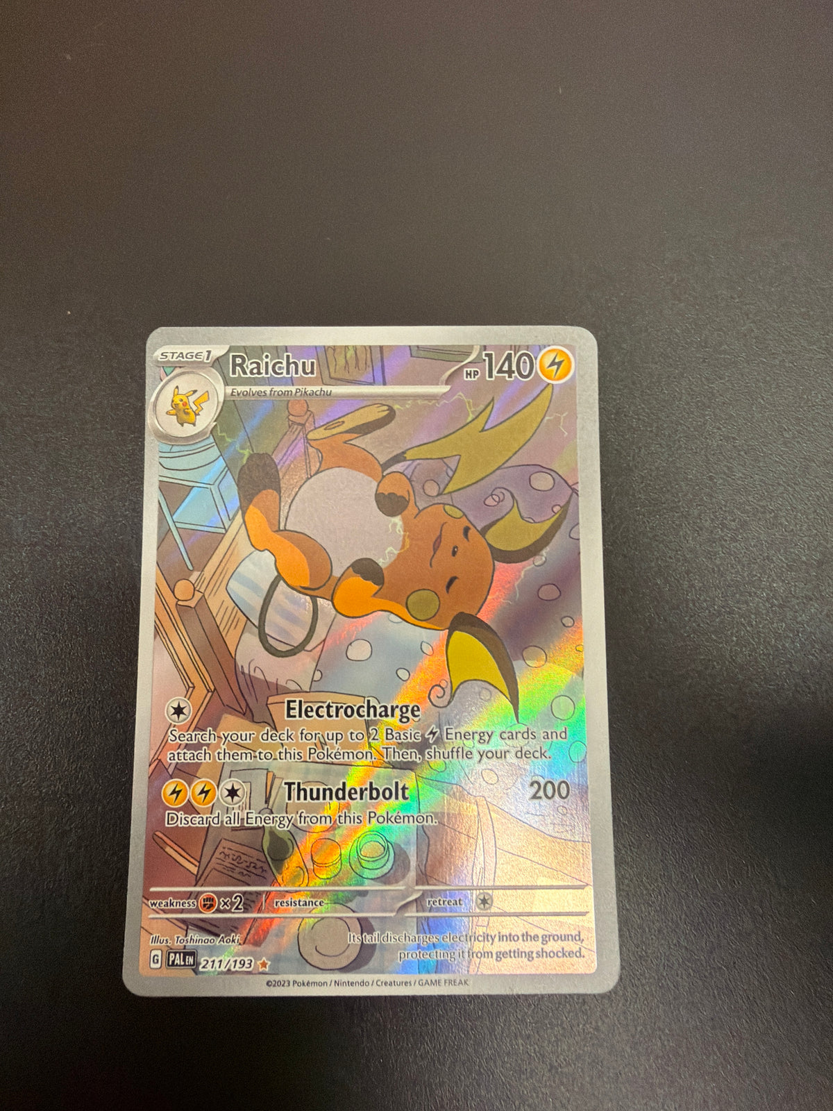 PALDEA EVOLVED RAICHU 211/193 PK1757 RAW